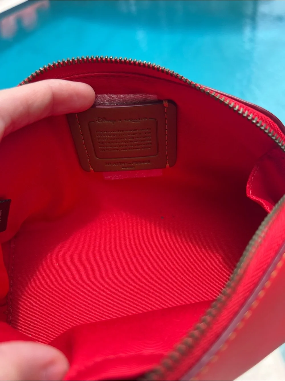 Coach Mickey Mouse Disney Red leather cosmetic zip bag F59820